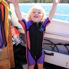 Poppy chuffed with her hand me down wetsuit