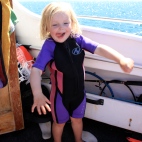 Poppy chuffed with her hand me down wetsuit